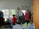 BadMojo, Kurrelgyre, Coldforged, and Ranger Rick playing Rock Band.