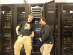 Taylor and Ben, posing in front of the cabinet