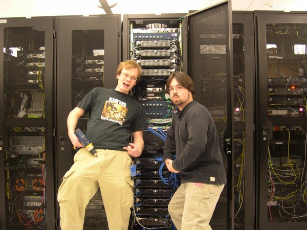 Taylor and Ben, posing in front of the cabinet