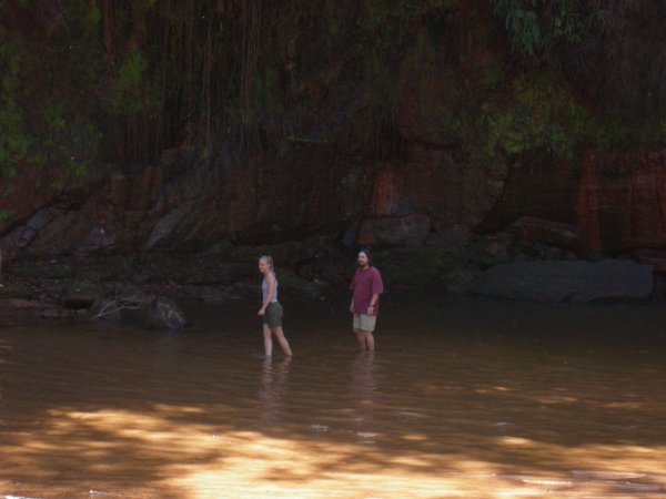 Ashton and Ben wading in the lagoon -- the water is not very deep except for close to the waterfall