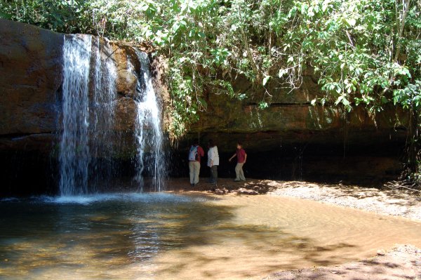 Ben, Cynthia, and Matthew under the waterfall