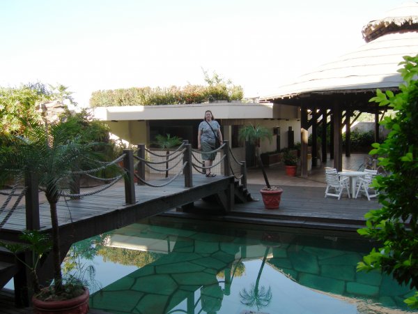 Cynthia on the neat little bridge over the hotel swimming pool.