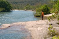 a guide waiting on the side of the river