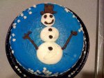 A rather promiscuous snowman cake.