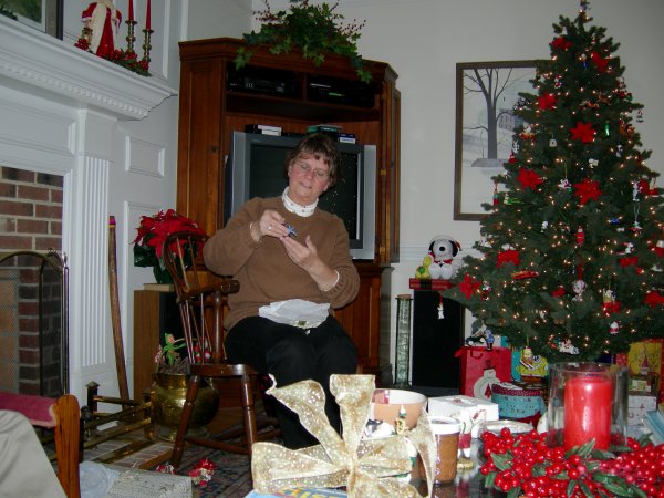 Sally opening a gift