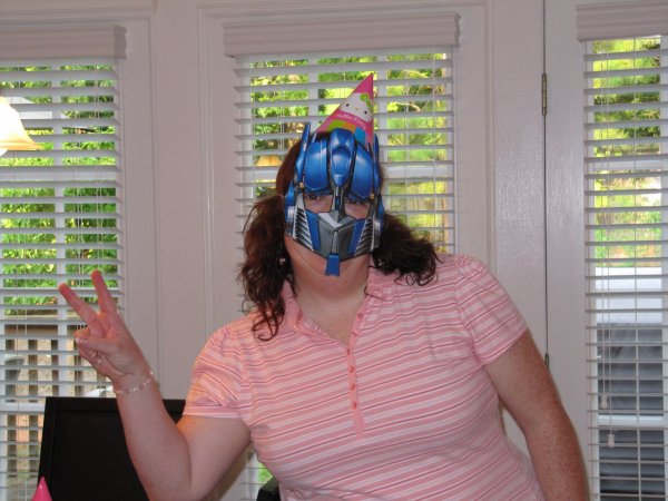 Cynthia, with mask and hat