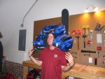 Chris is either wearing motorcycle bags, or he's the King of All Cosmos