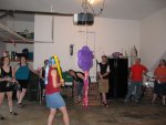 Ashton swinging at the piñata