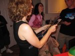 Courtney hands out Darth Maul glowstick wands