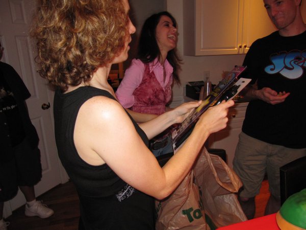 Courtney hands out Darth Maul glowstick wands