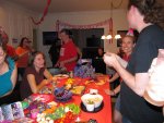 everyone is gathered around playing with goodies