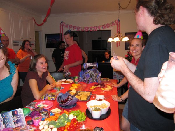 everyone is gathered around playing with goodies