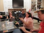 Playing Apples to Apples.  Louie ate Nitin's candy.