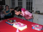 Holly blowing out the candles