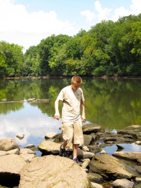 Matthew walking around on the rocks