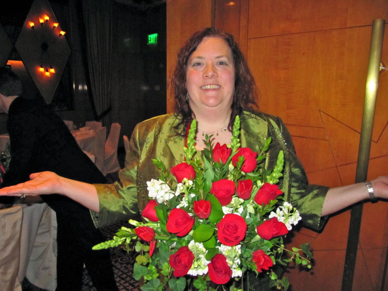 Cynthia wearing flowers around her neck