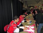 Kostopoulos signing Stephanie's jersey
