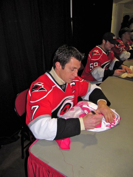 Brindy signing Stephanie's jersey