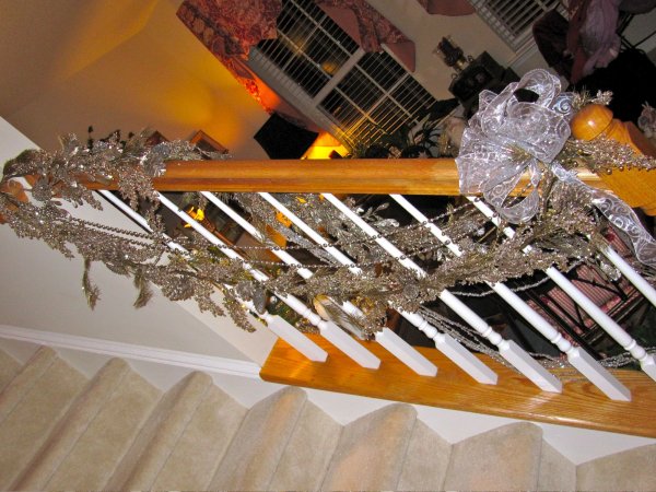 the bannister - Batman style!