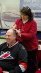 getting a hurricanes logo painted on his, um, bald spot =)