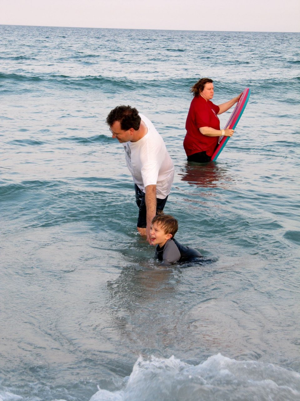 at the beach: Mike, Cameron, and Lysa
