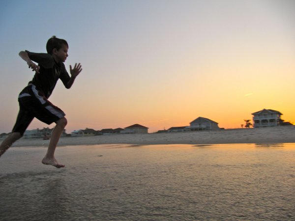 Cameron running on the beach