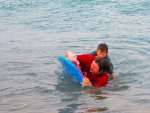 at the beach: Lysa and Cameron are falling over