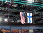 American and Finnish flags hanging from the ceiling