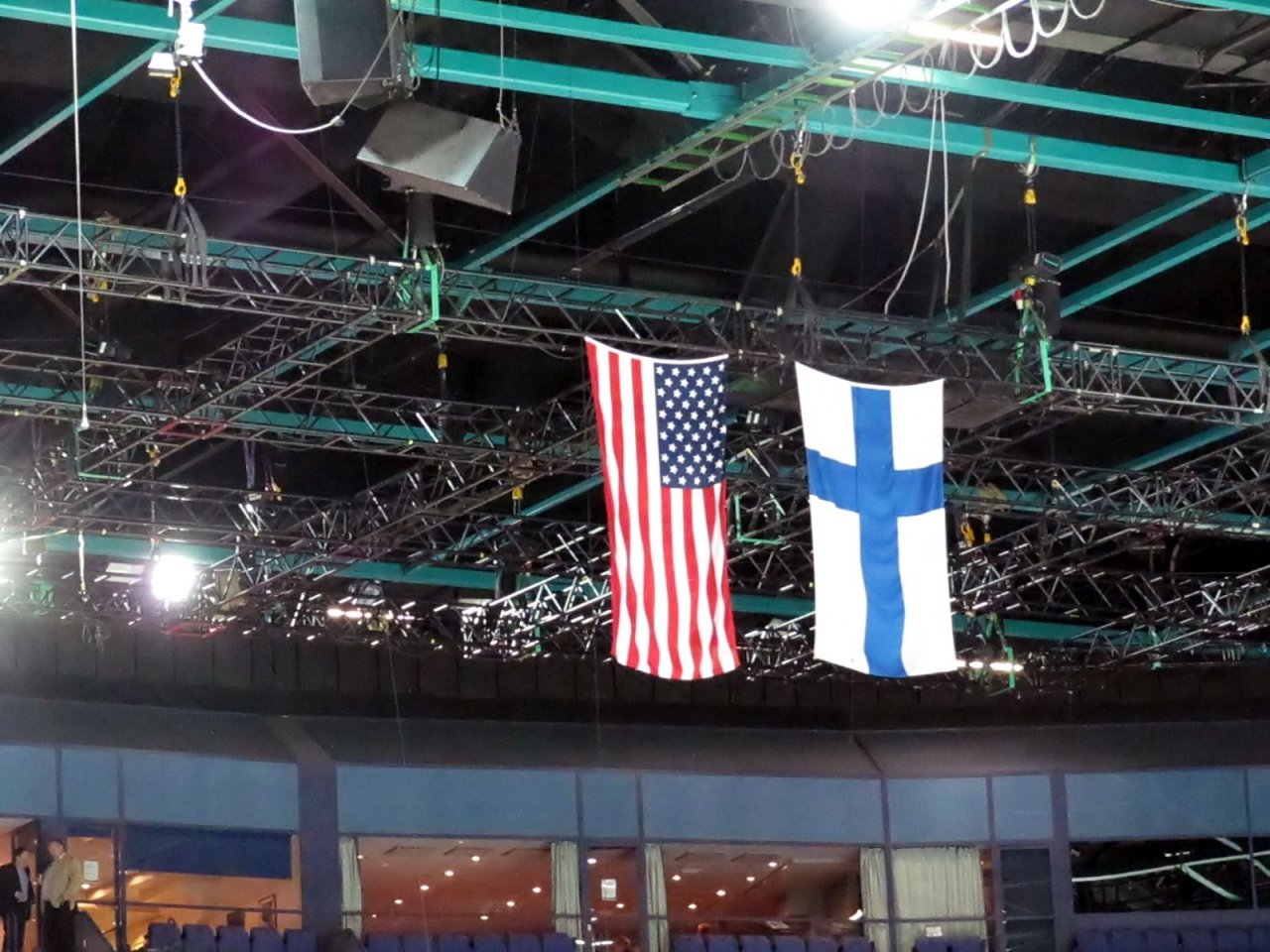 American and Finnish flags hanging from the ceiling