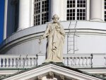 One of the statues on the West side of Helsinki Cathedral.