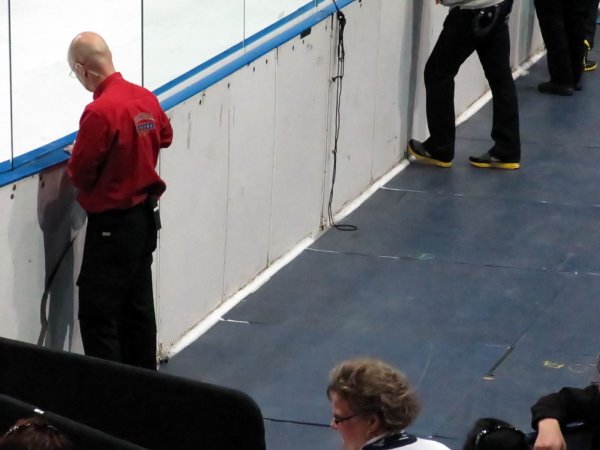 Olympic ice shrunk down to NHL size...  :)