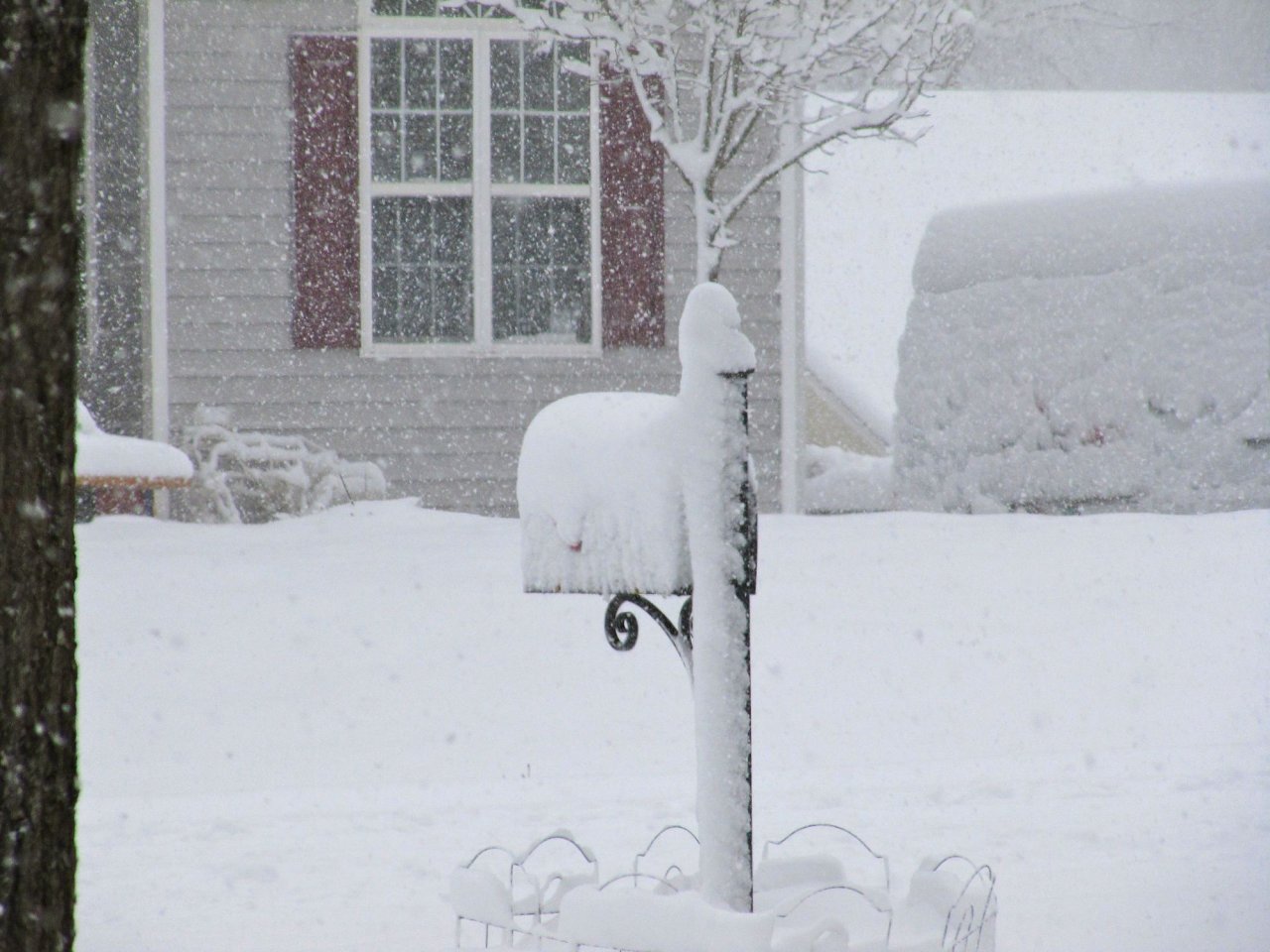 Mailbox with a hat of snow.