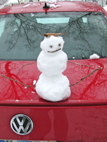 a Christmas tradition: snowman on the car!