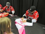 LaRose signing Stephanie's jersey