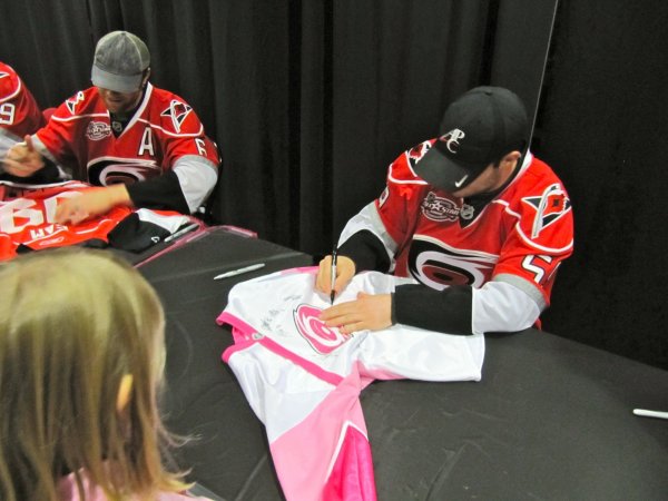 LaRose signing Stephanie's jersey