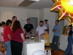 the whole group, Matthew is lighting the cake