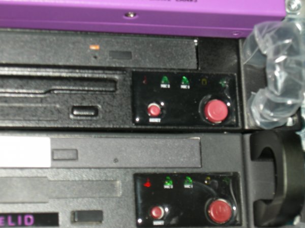 The little red button on the left is the reset button...