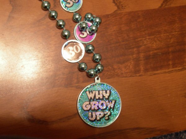 close-up of the "Why Grow Up?" necklace
