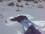 Cynthia making a snow angel
