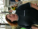 A lorikeet licks Cynthia's ear, and then, um... uh-oh.  :)