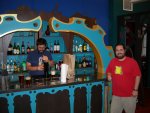 me posing at the bar (thumbs up!) with Landon still pouring beer  :)